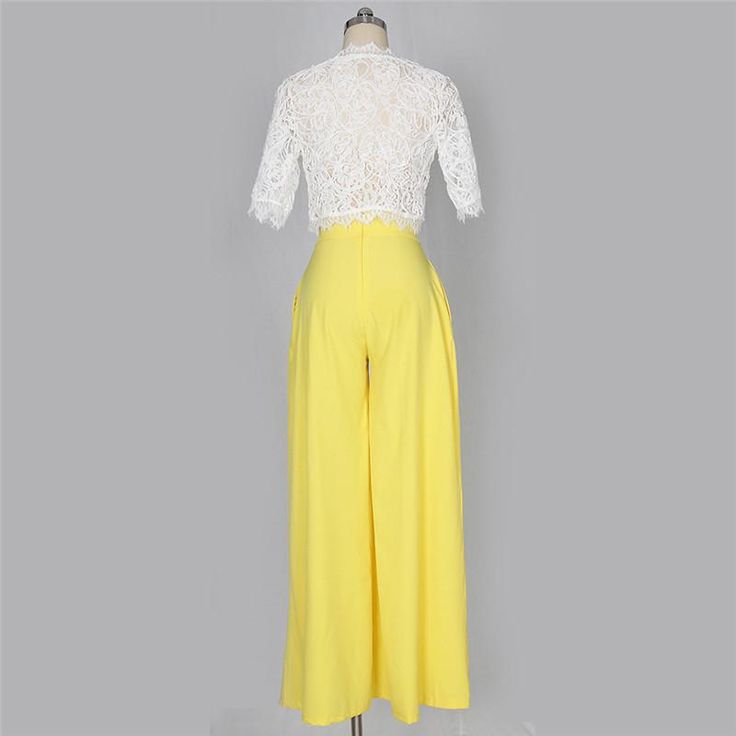 This sassy but sweet pants set is absolutely perfect. Featuring a white cropped lace top and polyester pants with bold color, featuring front pockets, a high elastic waist and wide leg flared pants. This pants set pairs perfectly with wedges, heels or booties. Does in 4 fabulous pants colors from which to choose. Hip Clothes, Cropped Wide Leg Pants, Polyester Pants, Lace Short, Off Shoulder Sweater, Crop Top And Shorts, Lace Crop Tops, Short Leggings, Casual Sets