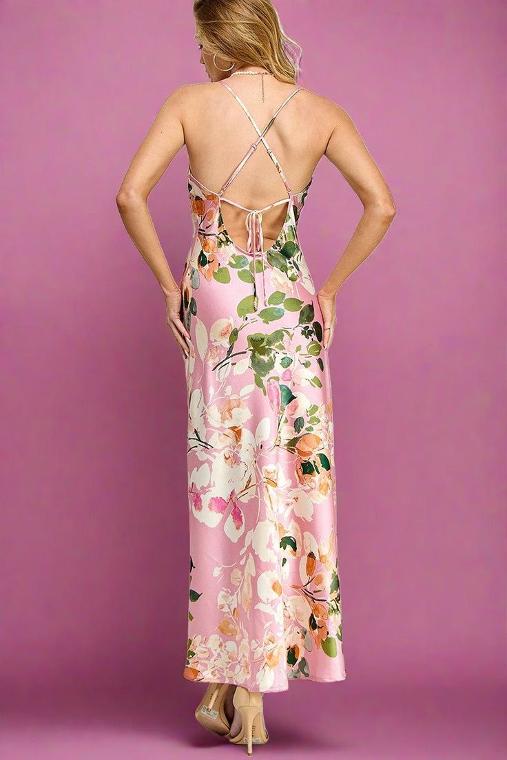 Floral Print Open Back Satin Slip Dress Get ready to turn heads and feel absolutely stunning in this floral print open back satin slip dress. Featuring a silky smooth fabric and a flirty cut, this dress will have you feeling confident and beautiful. Perfect for any occasion, you'll make a statement and be the center of attention wherever you go. Elevate your wardrobe with this must-have piece! 100% Mixed Poly Floral Print Open Back Satin Slip Dress Satin Maxi Dress With Tie Back, Feminine Silk Floral Dress For Spring, Flirty Backless Floral Print Dress, Flirty Backless Dresses With Floral Print, Flirty Floral Print Prom Dress, Backless Floral Print Dress For Night Out, Floral Print Backless Dress For Night Out, Silk V-neck Slip Dress With Floral Print, Spring Night Out Slip Dress With Strappy Back