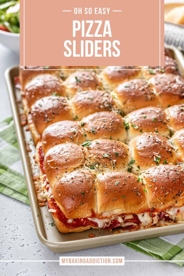 homemade pizza sliders on a baking sheet with text overlay that reads, oh so easy pizza sliders