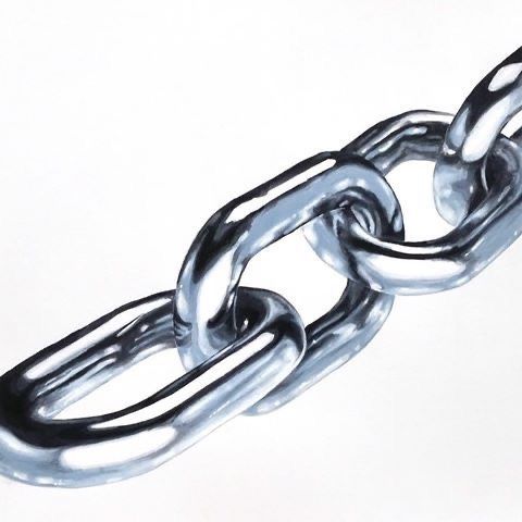 a large metal chain is shown on a white background with the link still attached to it