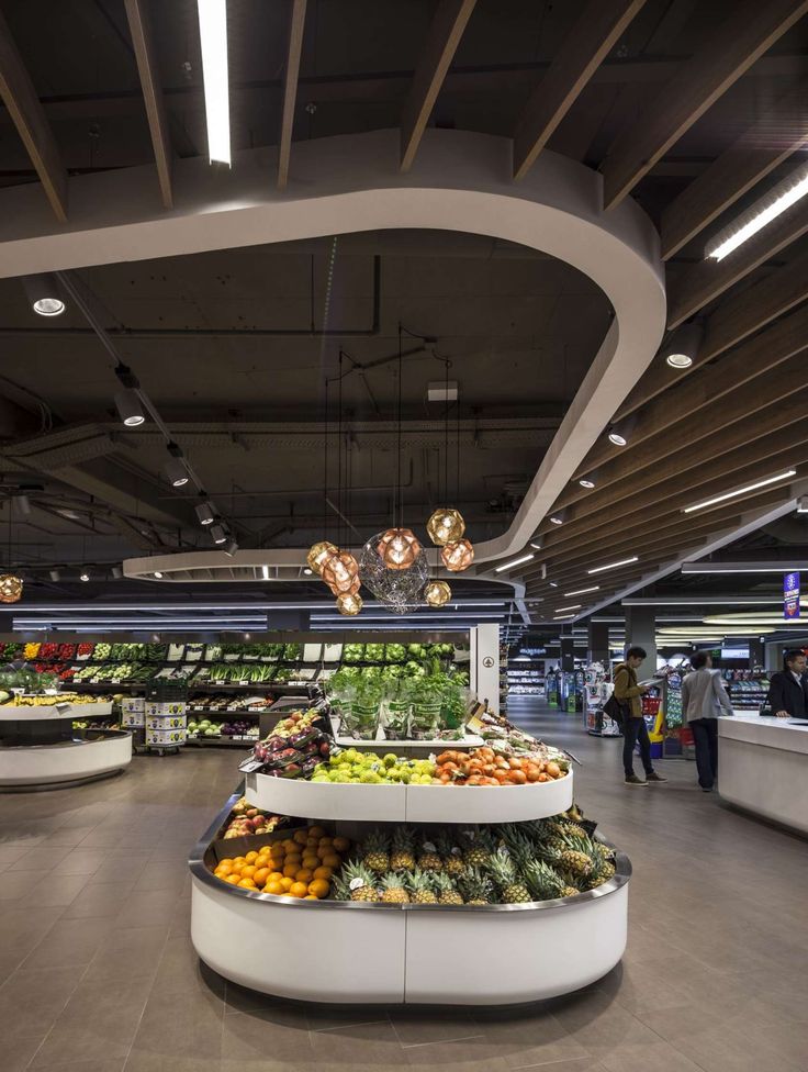 an indoor produce section in a grocery store