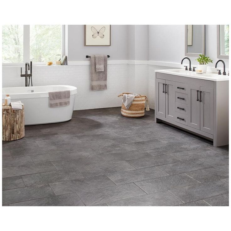 Daltile Cascade Ridge Slate Ceramic Tile  The Daltile Cascade Ridge Slate Ceramic Tile combines the timeless elegance of slate with the resilience of ceramic, making it perfect for both residential and commercial use. With its matte finish and rich gray tones, this tile adds a sophisticated touch to any room. Whether for walls or floors, its waterproof, scratch-proof surface ensures durability and easy maintenance.   Key Features:   Elevated Design:  Smoky gray stone look creates a modern and el Grey Slate Bathroom, Slate Bathroom, Dark Tile, Laundry Room Flooring, Slate Tile, Ceramic Floor, Room Flooring, Floor And Wall Tile, Wall Tile