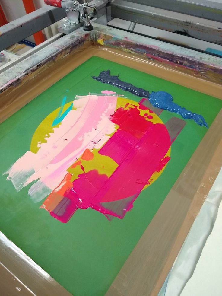 an art project is being made with colored paper