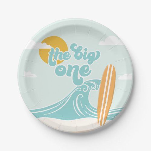 a paper plate that says the big one with a surfboard on it