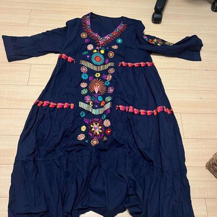 Never Worn Boho Tunic Dress With Floral Pattern. Casual Blue Embroidered Dress For Vacation, Casual Blue Long-sleeved Embroidered Dress, Blue Floral Embroidery Dress For Vacation, Blue Embroidered Long Sleeve Summer Dress, Blue Long Sleeve Embroidered Summer Dress, Blue V-neck Dress With Embroidered Hem, Blue Bohemian Embroidered Dress For Spring, Casual Blue Embroidered Beach Dress, Bohemian Long Sleeve Embroidered Blue Dress