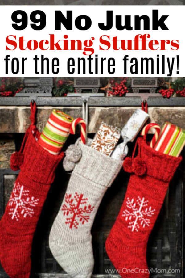 stockings hanging from the fireplace with text overlay saying 99 stocking stuffer ideas for the entire family