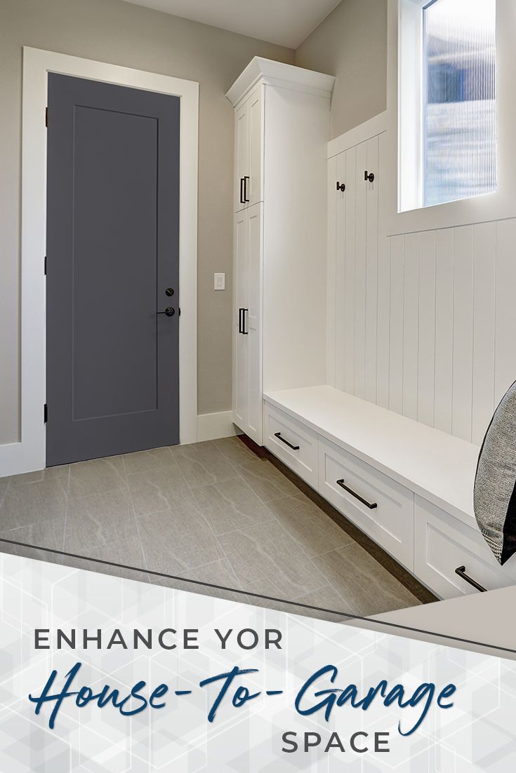 the entrance to a garage with white cabinets and gray doors, is shown in this advertisement