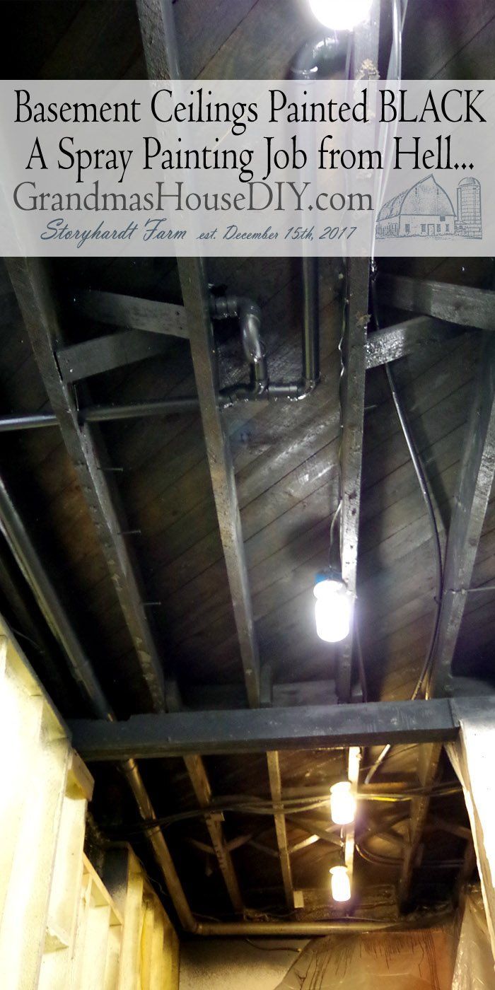 basement ceilings painted black with text overlay that reads basement ceilings painted black a spray painting job from hell grandma's house diy com