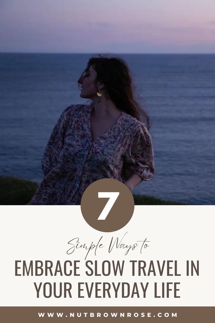 a woman standing in front of the ocean with text overlay that reads 7 simple ways to embrace slow travel in your everyday life