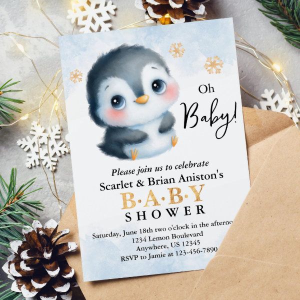 a penguin baby shower party with pine cones and snowflakes