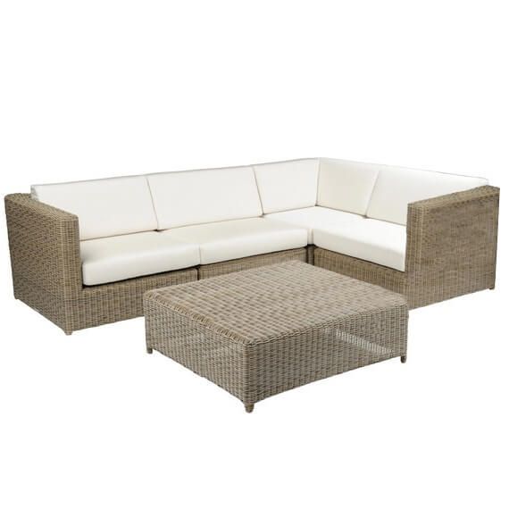 an outdoor furniture set with white cushions and a coffee table on the bottom right side