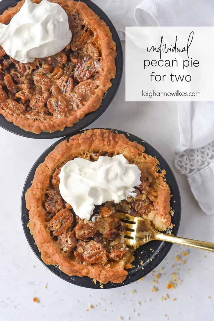 two pecan pies with whipped cream on top