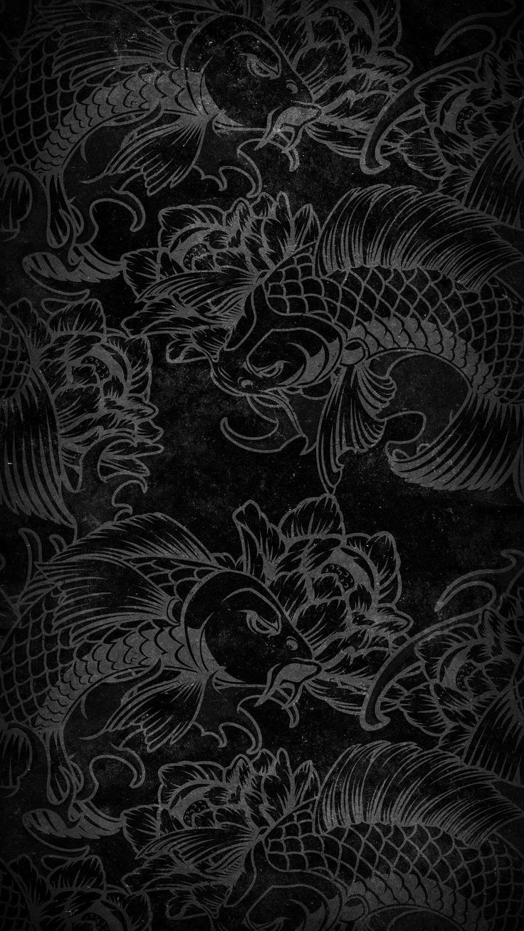 a black and white photo with dragon designs on it