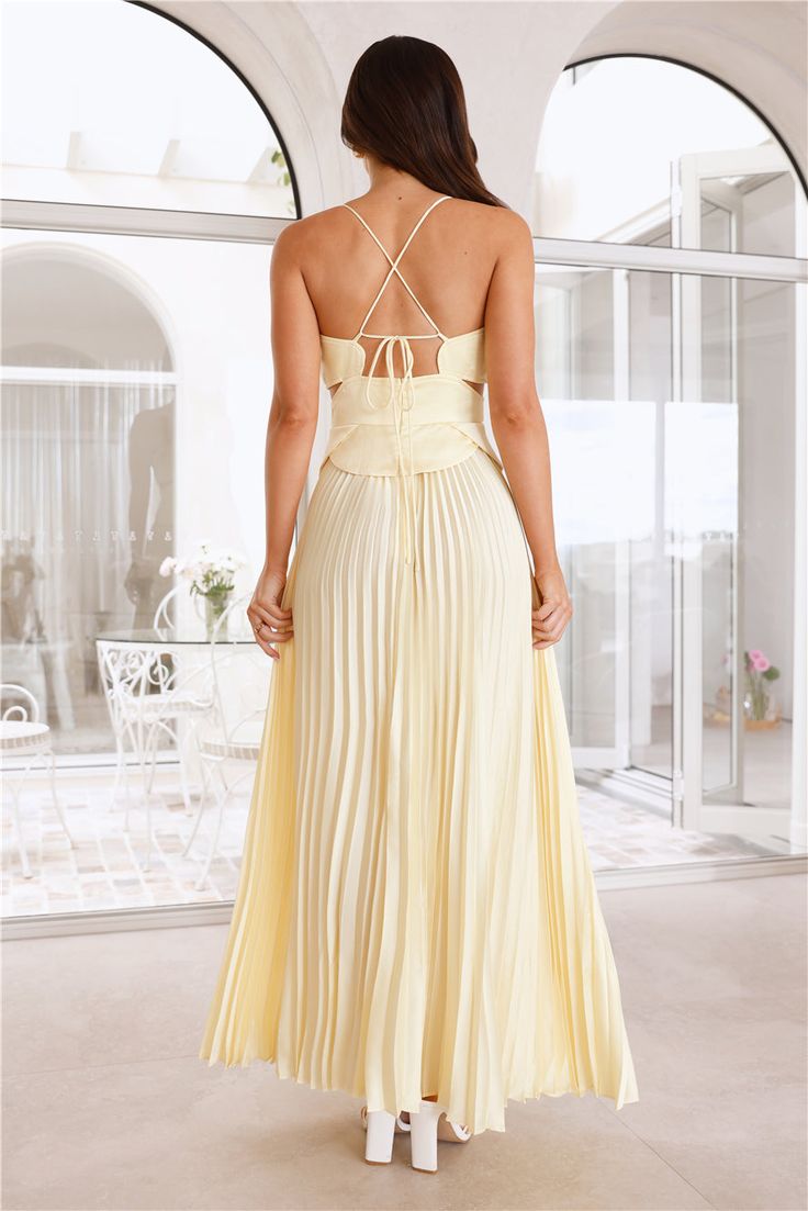 Length from bust to hem of size S: 122cm. Chest 39cm, Waist 34cm, across front only of size S. Maxi dress. Semi-lined. Model is a standard XS and is wearing size XS. True to size. Non-stretch. Pleated skirt. Cutouts to the top. Tie-up back. Invisible zipper, hook eye closure. Cold hand wash only. Polyester. A sophisticated style that's perfect for your next fancy event. The Sunny Spell Maxi Dress features a gorgeous pleated skirt, cutouts to the top and a tie-up back. Style with heels for all th Fancy Event, Prom Shopping, Maxi Dress Prom, Dress Yellow, Wedding Bridesmaid Dresses, Hook Eye, Wedding Bridesmaids, Sophisticated Style, Invisible Zipper