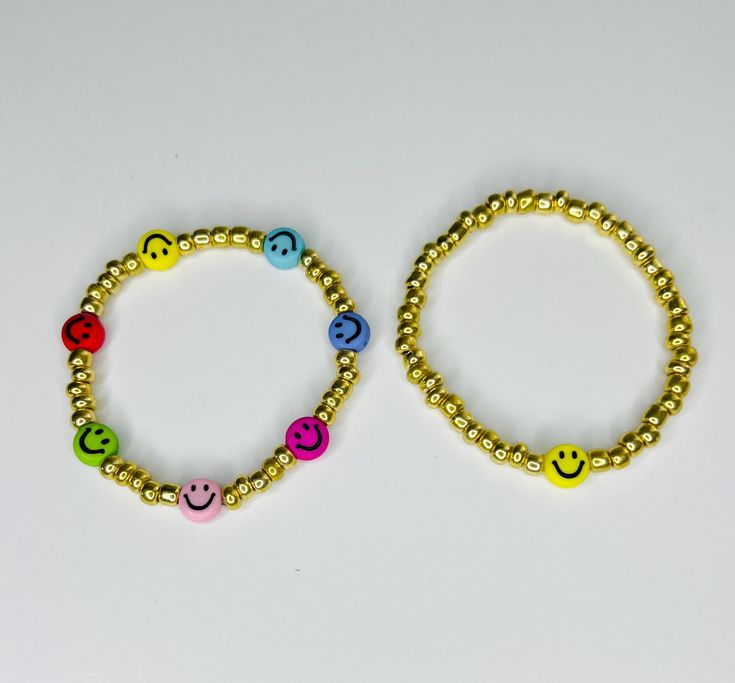 New to bay creations these cute little smiley beaded bracelets.  Bracelets are made out of 4 mm glass and acrylic beads strong on elastic cord. Playful Gold Friendship Bracelets With Letter Beads, Playful Friendship Jewelry With Round Beads, Cheerful Round Bead Bracelets As Gift, Fun Gold Bracelets With Letter Beads, Cheerful Round Beaded Bracelets As Gift, Gold Friendship Bracelets With Colorful Beads For Birthday, Birthday Gold Friendship Bracelets With Colorful Beads, Smiley Face Beaded Bracelets As Gift, Smiley Face Round Beads Bracelet For Gift