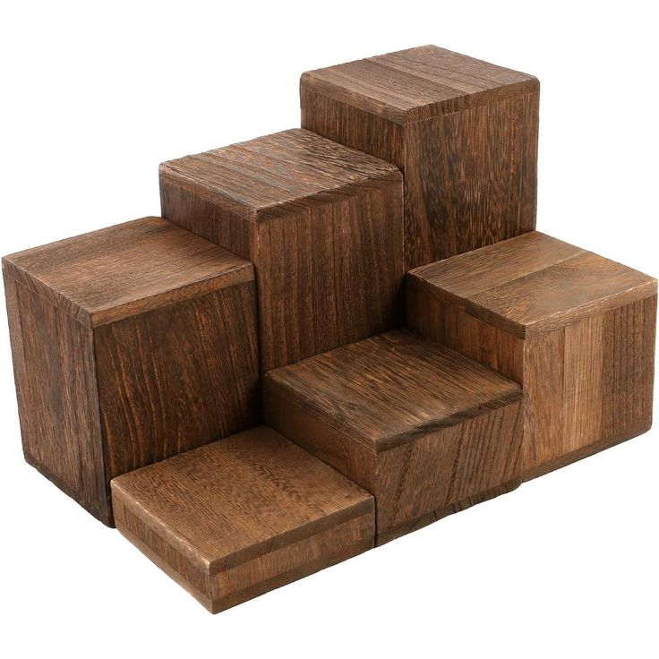 several wooden blocks stacked on top of each other