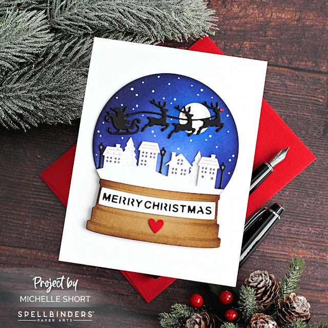 a christmas card with a snow globe and santa's sleigh on it