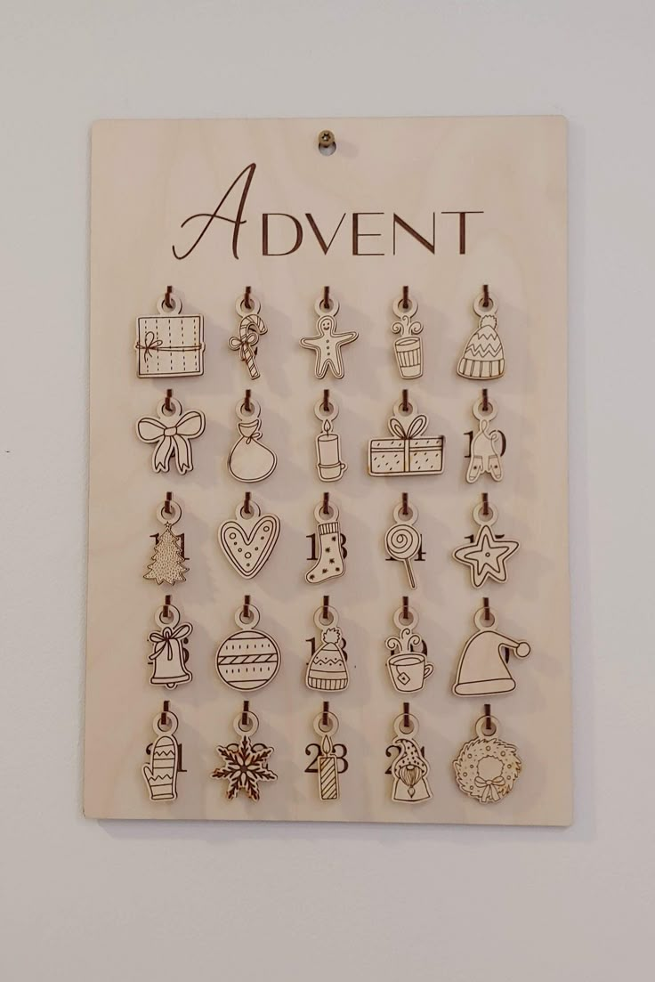 an advertise with many charms hanging on it's side, including christmas decorations