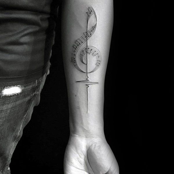 a person's arm with a tattoo on it and a musical note in the middle