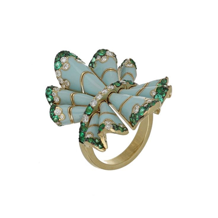 Ref. FF158RG24 Foulard Ring, Yellow Gold, White Diamonds, Emeralds. This Foulard ring handcrafted with 18K yellow gold, white diamonds, emeralds, and turquoise enamel, the ring bends and folds, resembling the texture of silky textiles. Drawing inspiration from the beauty of the feminine silk scarf. Gold: g 16.50 | White Dia: ct 1.00 | Emerald: ct 1.08All weights are approximate. Slight variations may occur due to the nature of handmade craftsmanship.NOT AVAILABLE IN USA Luxury Green Enamel Jewelry, Green Enamel Fine Jewelry Ring, Green Enamel Ring For Formal Occasions, Green Enamel Jewelry With Gemstones, Green Enamel Jewelry For Wedding, Green Enamel Wedding Jewelry, Elegant Green Enamel Ring, Green Enamel Ring For Anniversary, Unique Green Enamel Ring For Anniversary