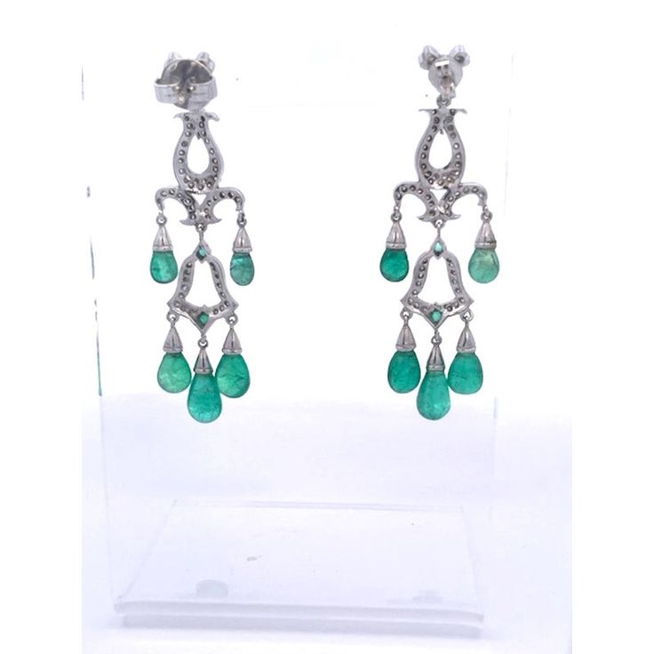 This is part of Chairish’s Fine Jewelry assortment.  These gorgeous Chandelier Earrings are just beautiful.  They are made in 14K white Gold and set with five (5) Emerald Cabochon drops, three (3) small Emeralds are studded within the Diamonds. The length is 5.5 cm or 2 1/2" long.  These earrings pack a punch as they are just stunning.  There are probably approximately 2 carats of Diamonds  throughout.  These earrings are lovely by themselves but I also have a gorgeous pendant that works perfect Classic Chandelier Dangle Earrings With 17 Jewels, Elegant White Gold Pear-shaped Chandelier Earrings, Formal Pear-shaped Chandelier Earrings, White Gold Pear-shaped Chandelier Earrings, White Gold Teardrop Chandelier Earrings Fine Jewelry, White Gold Teardrop Chandelier Earrings, White Gold Chandelier Earrings With Elegant Design, Fine Jewelry Chandelier Earrings With 17 Jewels, Elegant Hand Set Pear-shaped Earrings