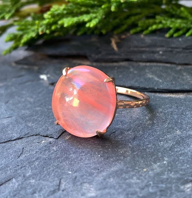 "14k Rose Gold Sterling Silver Cherry Quartz Hammered Band Ring Size 6.75 Up for offer is a beautiful hand made 14k rose gold over solid sterling silver charry quartz cabochon hammered band ring. Ring is marked \"925\". Measurements Ring Size: 6.75 Band Width: 1.5mm Cherry Quartz: 13mm x 13mm x 4.2mm Weight: 2.4 g Materials -14k Rose Gold -Sterling Silver -Cherry Quartz Condition: New; Please inspect pictures for overall condition. This item comes from a clean, smoke free household. Item will sh 14k Rose Gold Polished Rings, Handmade 14k Gold Pink Jewelry, Round Gemstone Jewelry In Rose Gold, Hallmarked Rose Gold Jewelry, Handmade Pink 14k Gold Jewelry, Round Gemstone Rose Gold Jewelry, Round Rose Gold Gemstone Jewelry, Adjustable Rose Gold Ring With Polished Finish, 14k Rose Gold Ring With Polished Finish As Gift