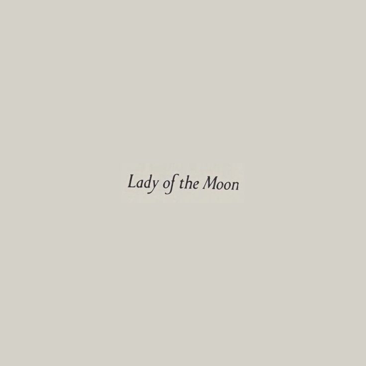 lady of the moon written in black ink on a gray background with an arrow pointing to it