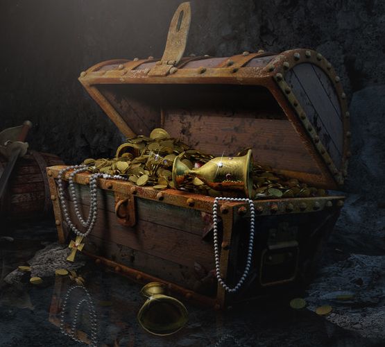 an open trunk filled with gold coins sitting on top of a floor next to other items