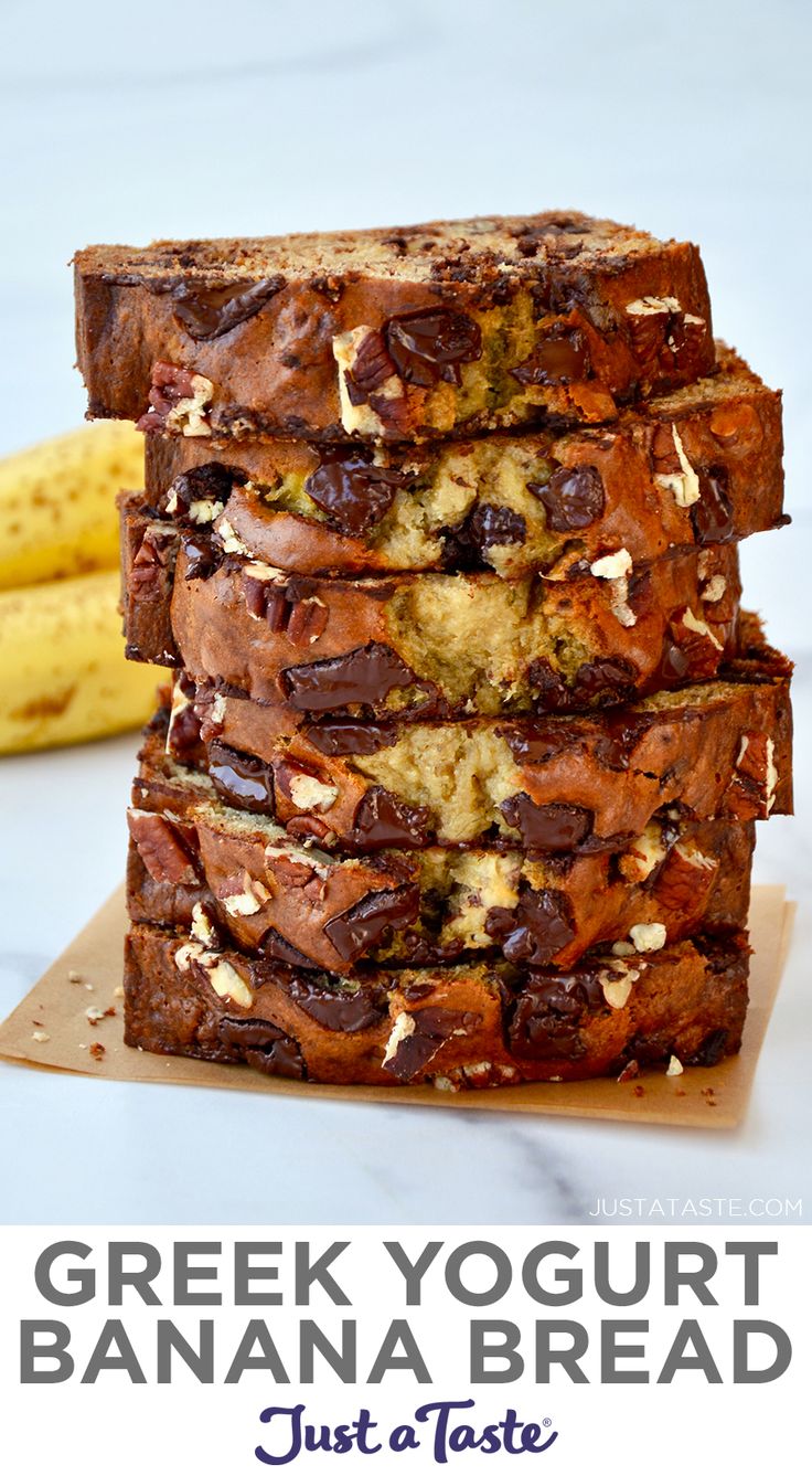 chocolate chip banana bread stacked on top of each other next to a bunch of bananas