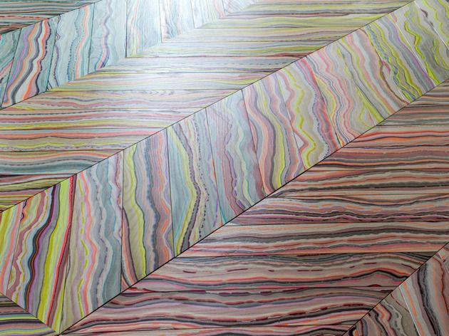 an abstract painting with multicolored lines on it