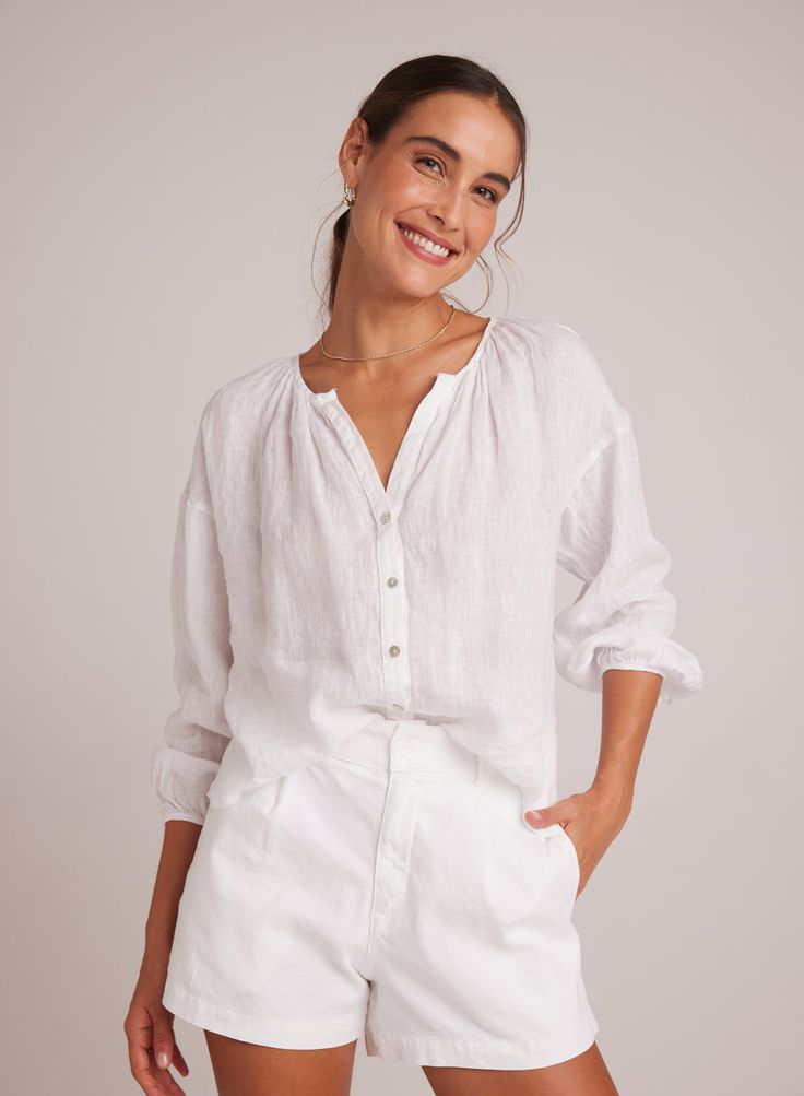 Coming Soon! To be notified of availability sign up for the waitlist. Elevate your wardrobe with our Shirred Neck Blouse , designed for a flowy fit that is both breezy and comfortable. This fun and versatile top is perfect for any occasion, whether you're dressing up for a night out or keeping it casual for a day at the beach. Made from soft tissue linen. 100% Linen Blouse Designed, Comfortable Blouses, Bella Dahl, Leather Outerwear, Cardigan Sweater Dress, Dress The Population, Linen Blouse, Leather Blazer, Romper With Skirt