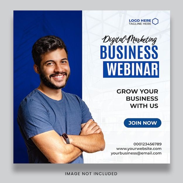 a man with his arms crossed standing in front of a blue and white business poster