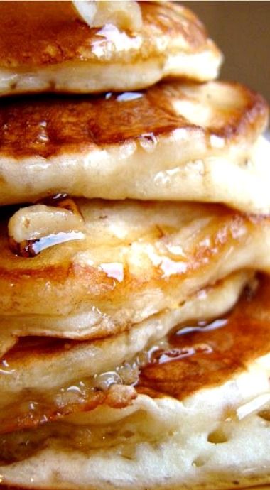 a stack of pancakes with syrup on top