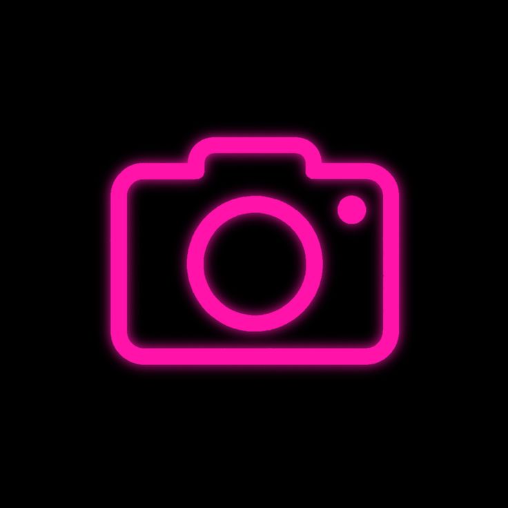 a neon pink camera on a black background