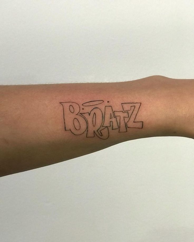 a person's arm with the word braz written on it in black ink