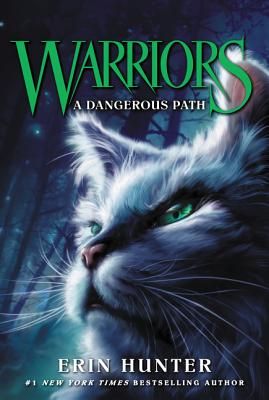 the cover of warriors dangerous path, featuring a cat's face and green eyes