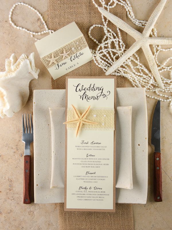 a table setting with place settings and napkins