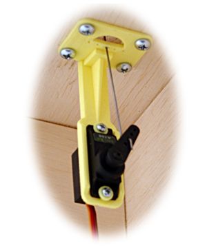 a close up of a yellow latch on a wooden door with screws and bolts