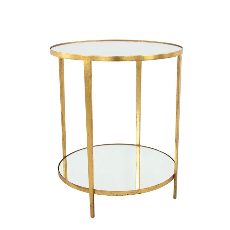 a round glass table with gold metal frame