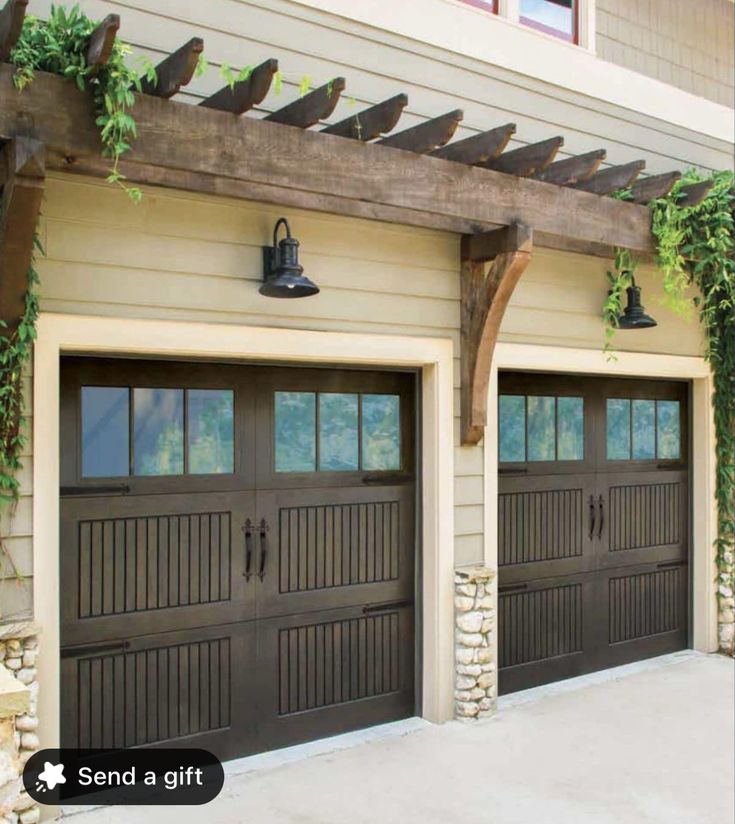 two brown garage doors with plants growing on the side of them and an attached pergolated trellis