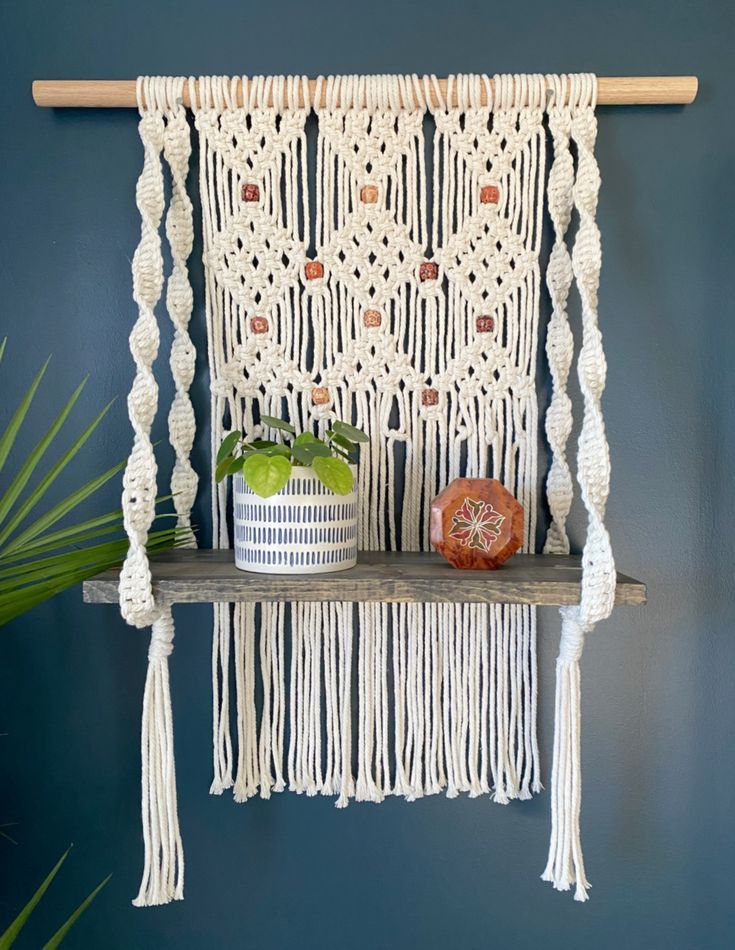 macramé hanging shelf Macrame Shelf Hanging Shelves Diy, Macrame Wall Shelf Pattern, Macrame Wall Hanging Shelf Diy, Macrame Shelf Pattern, Macrame Wall Hanging Shelf Tutorial, Macrame Shelves Diy, Macrame Hanging Table Diy, Diy Macrame Shelf Tutorial, Macrame Shelf Hanging Shelves