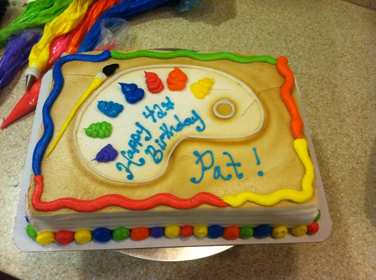 a birthday cake that has been decorated with colorful decorations