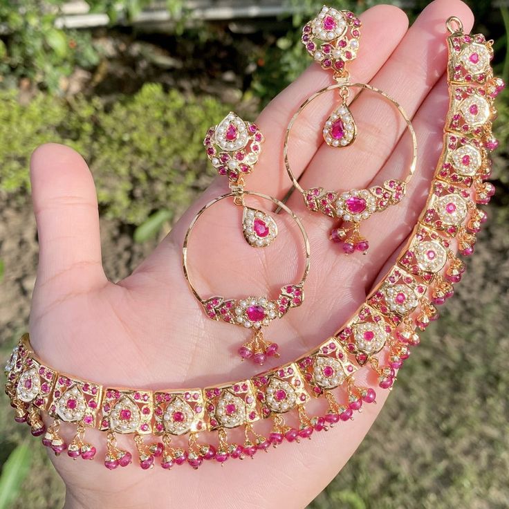 ruby necklace set with chandbali Red Ruby Temple Necklace For Celebration, Festive Red Temple Necklace, Elegant Kundan Chandbali Jewelry, Red Hand Set Temple Necklace For Celebration, Red Hand-set Temple Necklace For Celebration, Red Ruby Temple Jewelry Set, Festive Red Ruby Jewelry Set, Formal Ruby Temple Necklace For Festivals, Handmade Chandbali Jewelry For Formal Events