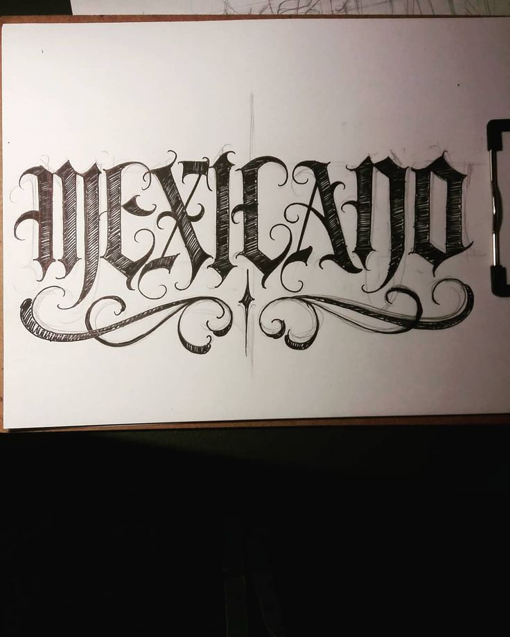 an old fashioned sign with the word mexico written in cursive writing