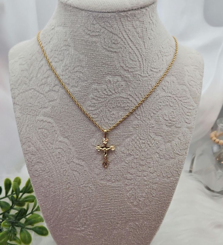 Gold Small Crucifix Necklace, 1mm French Rope Chain, 14k Heavy Plated Gold, Unisex Crucifix Necklace, 14k Heavy Plated Gold, Small Cross Necklace  High Quality Necklace, Lifetime Replacement Guarantee.  French Rope Chain is 1mm thick, pendant is approximately 20mm high and 15mm in width. E X P E D I T E D ∙ S H I P P I N G You will be able to choose faster shipping options when you add Priority Shipping upon checkout. Ship times do NOT include production times. However, if you select expedited shipping, we will try to get your order completed faster. We want you to be happy with your purchase, and we take pride in offering you well-made, quality products. If you have any questions or issues with an order, please don't hesitate to contact us! We look forward to messages you send us and welc Small Cross Necklace, Crucifix Necklace, Small Crosses, Rope Chain, Cross Necklace, Jewelry Necklace Pendant, Bathing Beauties, Plating, Pendant Necklace