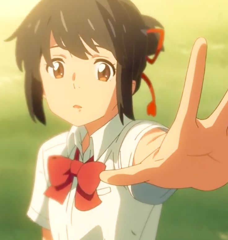 an anime character is giving the peace sign with her hand and wearing a bow tie