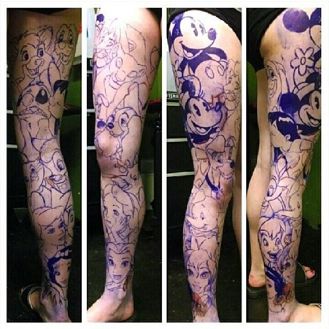 the legs are covered in blue ink with mickey mouse drawings on them, and there is no image here to provide a caption for