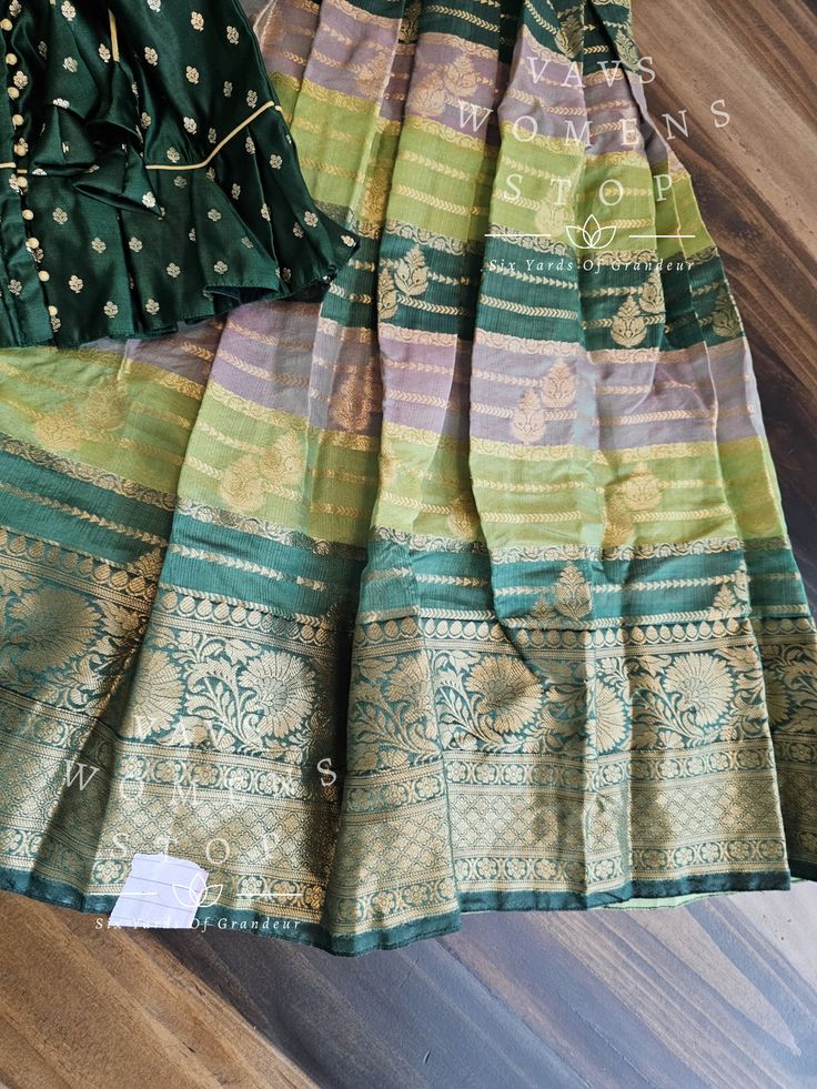 This Lehenga set suits 6 yr - 7 yr. Kindly Please Message me If needed measurements before purchase. Green Art Silk Saree-style Palazzo Set, Green Silk Cutdana Sets, Designer Green Lehenga For Transitional Season, Green Palazzo Set With Unstitched Blouse For Festivals, Designer Green Choli For Transitional Season, Green Chanderi Choli For Transitional Season, Transitional Green Silk Lehenga, Transitional Season Green Silk Lehenga, Transitional Green Silk Choli