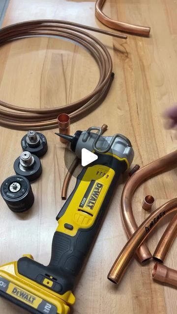 the tools are laying out on the table to be used in this project, as well as copper hoses