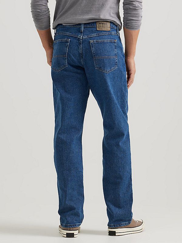 When it comes to all-day comfort, nothing comes close to the looser leg. Luckily, the Wrangler Authentics® relaxed fit flex jean offers a laidback look backed by a legendary heritage. It features our signature five-pocket styling and is crafted from a comfortable cotton blend with just a little bit of stretch for flexibility in your day to day. This easy jean features a relaxed fit and mid rise. Stretches For Flexibility, To Day, Dark Wash Denim, Men's Jeans, Mens Jeans, Mid Rise, Cotton Blend, Relaxed Fit, Things To Come